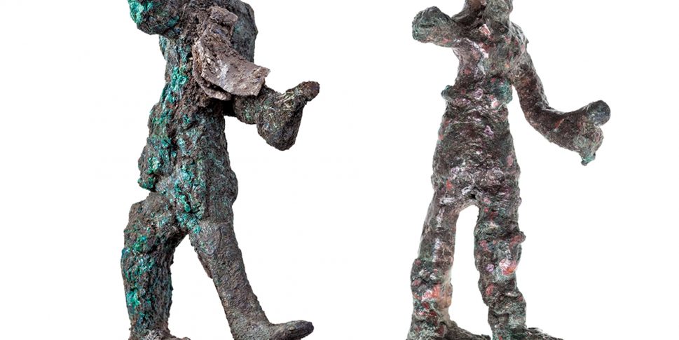 The two ‘smiting god’ figurines